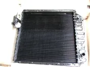 Радиатор водяной Т-150,А-352(дв.Д-260), комбайн СК-6 Нива,СК-6 Енисей,КСК-4 (дв.СМД-60,62,64) патрубок нижнего бака слева