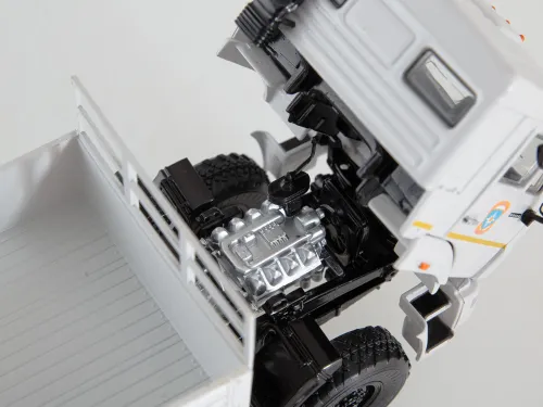 777.SSM1315 Игрушка - Масштабная Модель; КАМАЗ-43118 бортовой с тентом, МЧС КАМАЗ-УВК6