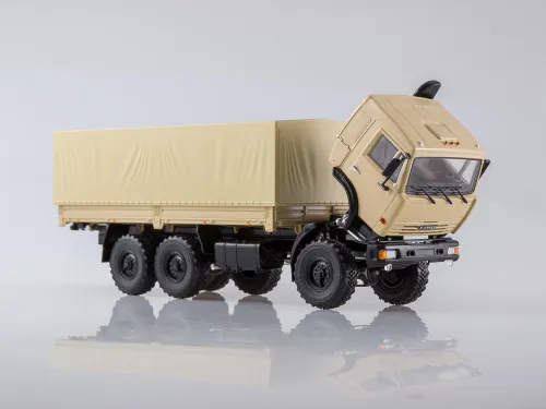 777.101623 Игрушка - Масштабная Модель; КАМАЗ-43118 бортовой с тентом в мягкой упаковке КАМАЗ-УВК2