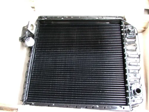 150-1301010-3 Радиатор водяной Т-150,А-352(дв.Д-260), комбайн СК-6 Нива,СК-6 Енисей,КСК-4 (дв.СМД-60,62,64) патрубок нижнего бака слева; 5-ти рядн. медный 2хd=42 560х650; Композит