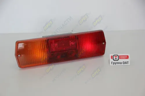 9802.3716-04 Фонарь задний КАМАЗ,ГАЗ,ЗИЛ левый 24в. с подсветкой 320х90; (6 болтов) (световозвращатель) ОСВАР