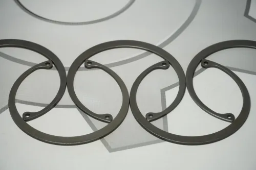 64221-2919032-СПЕЦМАШ Кольцо стопор. внутр. (в отвер.) с ушками ф94х106х2,8 1Б100 МАЗ шарнира реактивной тяги; ф106х94х2,8  1Б100 МАЗ шарнира реактивной тяги ГОСТ13943-86 СПЕЦМАШ